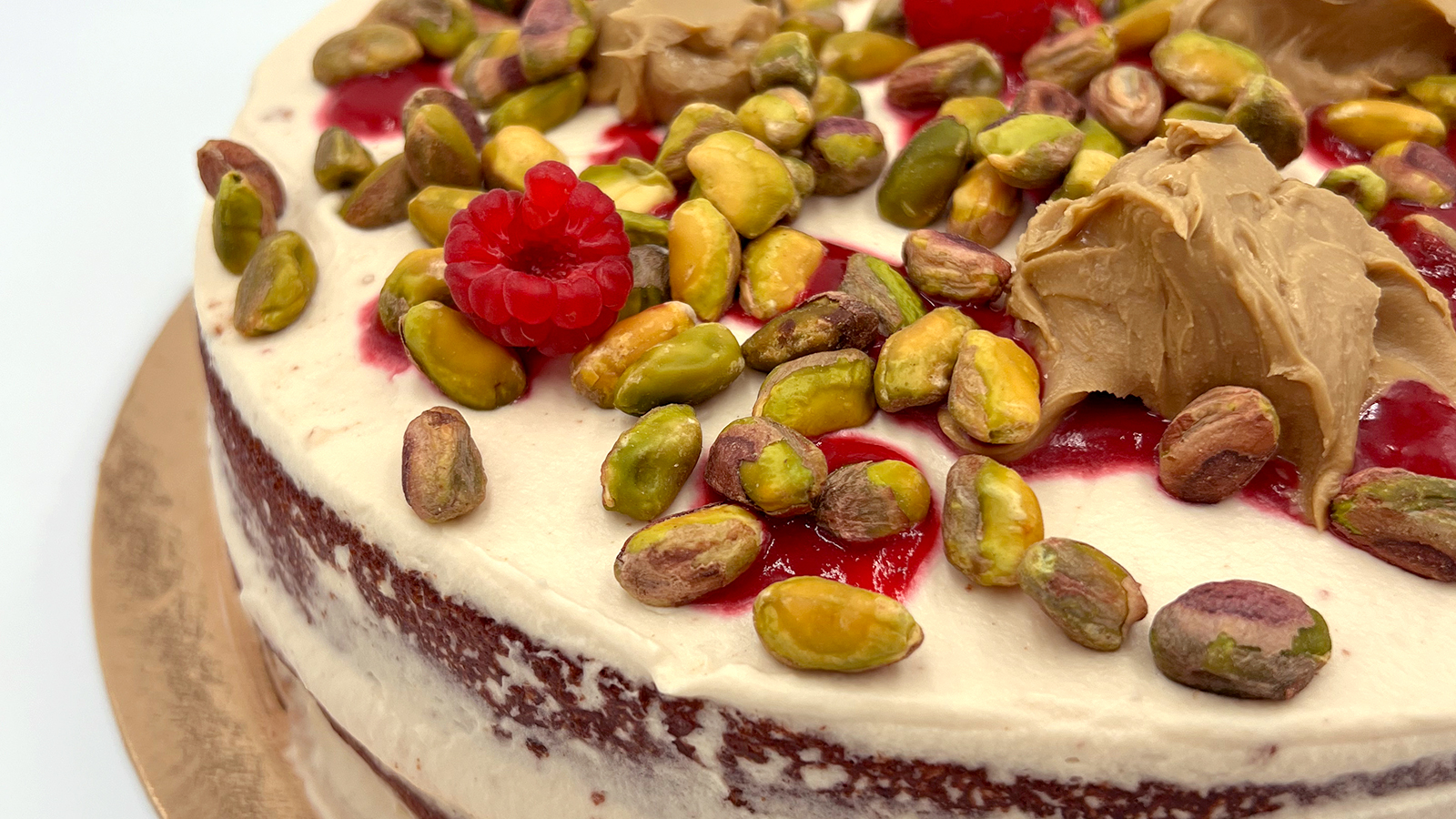 La petite Sara Cafetería Pastelería en Madrid Tartas artesanales Tarta de pistacho vainilla y frambuesa